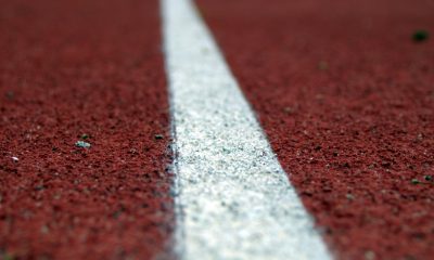 Detailed image of a running track line highlighting texture and pattern.