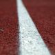 Detailed image of a running track line highlighting texture and pattern.